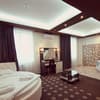 Отель Ambassador Plaza Hotel. Люкс двухместный с гидромассажной ванной 1
